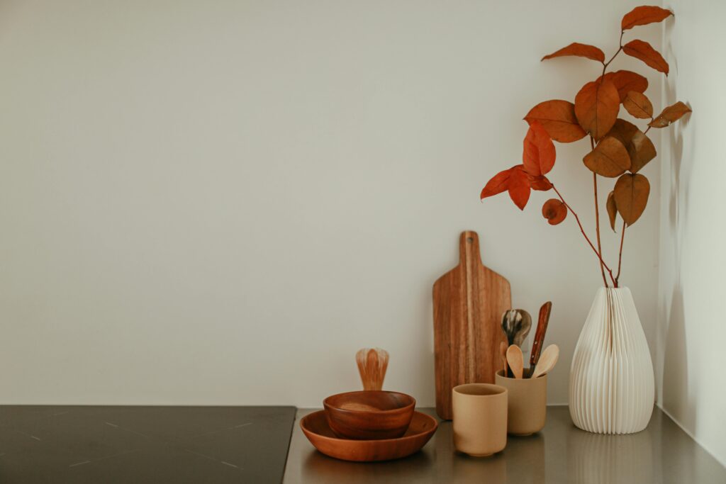 Vase with Plant, Tray and Bowls in Corner